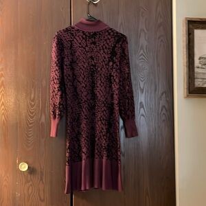 Blue Orchid long sleeved black and purple animal print midi sweater dress. XS